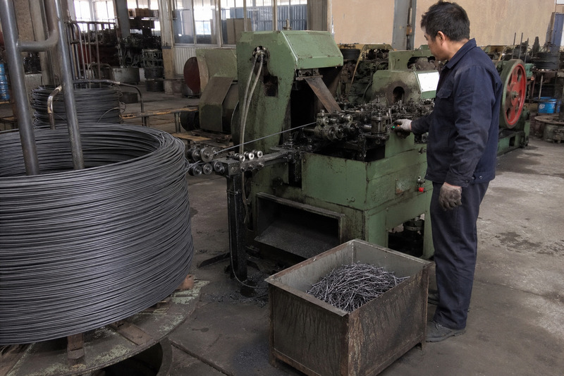 nails manufactured from steel wire rod through drawing and forming machines